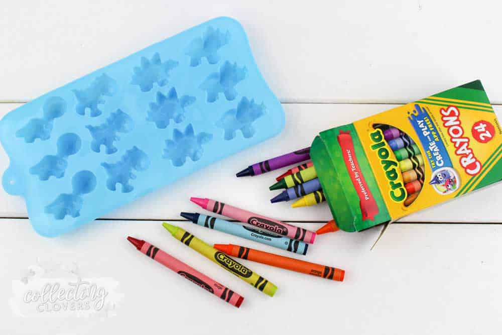 dinosaur silicone mold and box of crayons